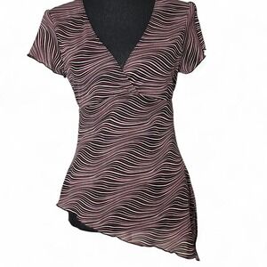 pink striped babydoll blouse with an asymmetrical hem and tie waist